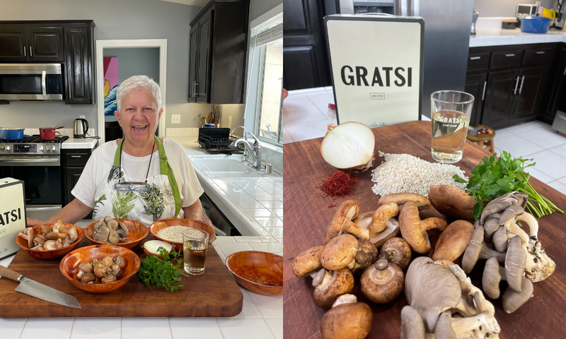 A smiling woman stands in a kitchen with fresh mushrooms, parsley, onions, and a glass of white wine on the counter. A close-up shows the same ingredients, labeled “GRATSI,” with rice, saffron, and more wine nearby.