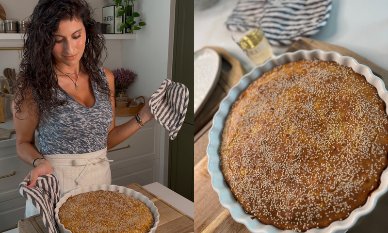A woman wearing an apron holds an oven mitt and stands by a freshly baked sesame-topped pie in a white dish, with a close-up of the golden pie shown beside her on a wooden surface.