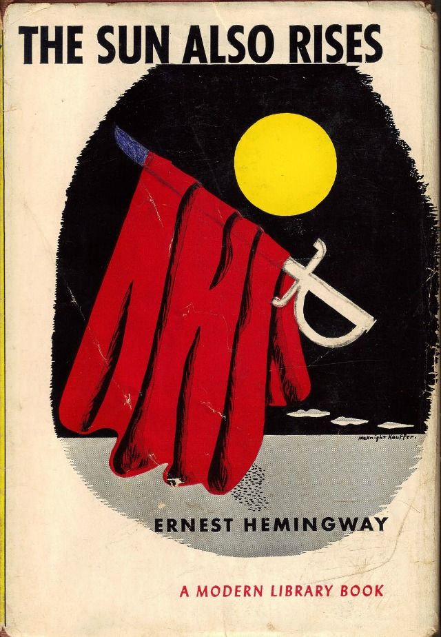 Book cover for The Sun Also Rises by Ernest Hemingway, featuring a red cape draped over a sword, with a yellow sun and black sky in the background. The title and author’s name are prominently displayed.
