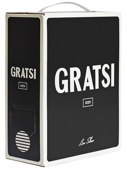 A black and white box of Gratsi Red wine with bold white text reading GRATSI RED and Live Slow on the front. The box has a handle on top and a dispenser tap on the side.