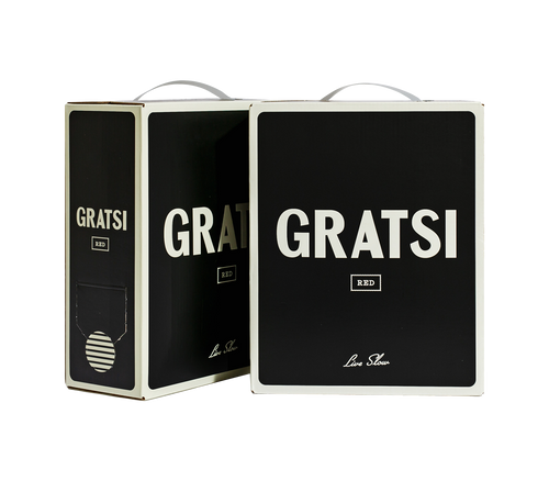 Two black boxes of Gratsi Red wine are shown on a white background, with bold white GRATSI lettering and a small label reading RED on the front. One box displays a wine spout.