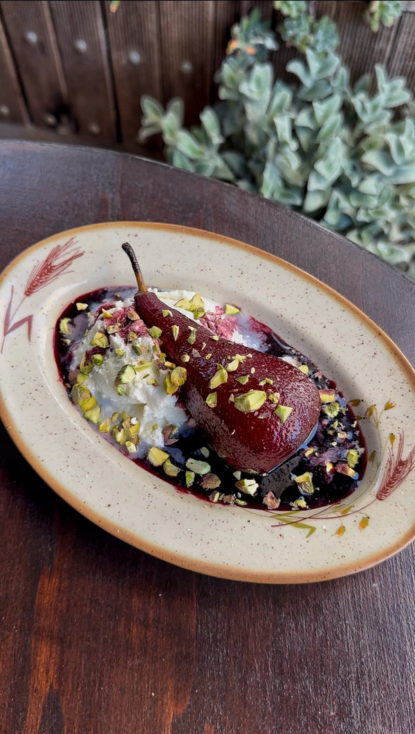 Poached pear in Gratsi Red Wine sauce
