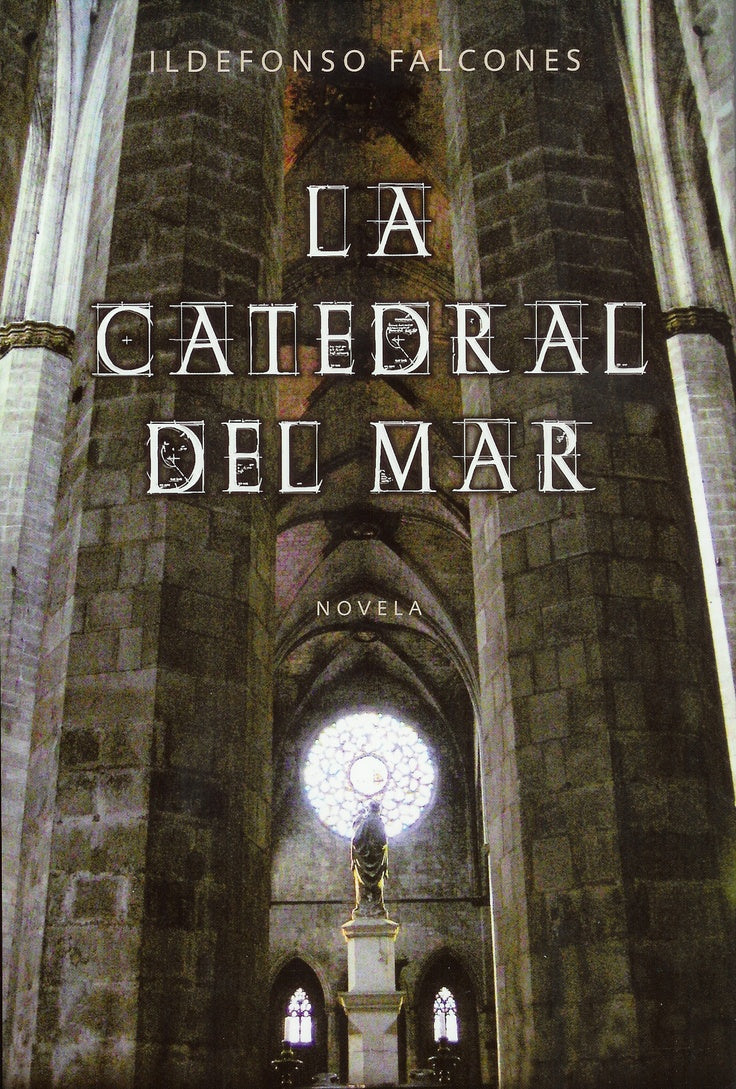 Book cover of La Catedral del Mar by Ildefonso Falcones, featuring a view of a grand stone cathedral interior with tall columns, stained glass windows, and a statue illuminated by light.
