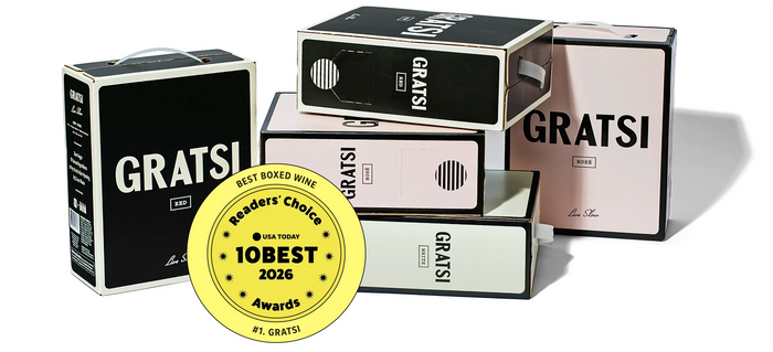 Five GRATS! boxed wines are stacked and arranged in various directions; a yellow USA Today 10Best 2026 Readers Choice award badge is shown in the front left.