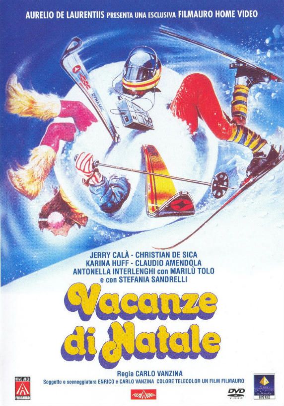 Illustrated movie poster shows skiing characters in winter gear tangled together on the snow with ski equipment, set against a snowy blue background. Title Vacanze di Natale appears in bold yellow letters at the bottom.