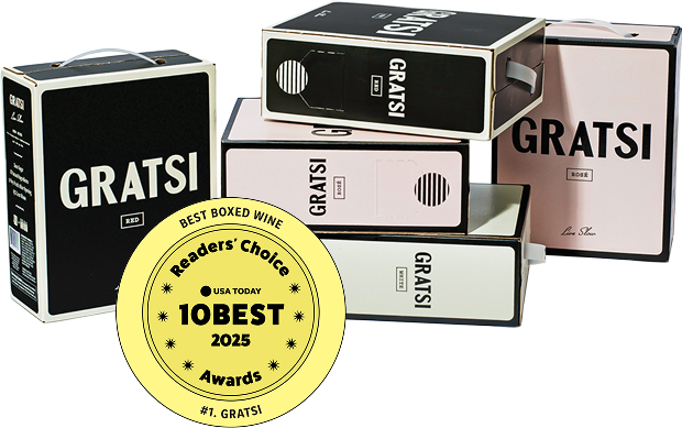 Stacked boxes of Gratsi boxed wine in black, white, and pink, with a yellow USA Today 10Best 2025 Readers’ Choice Awards badge for best boxed wine overlaid in the foreground.
